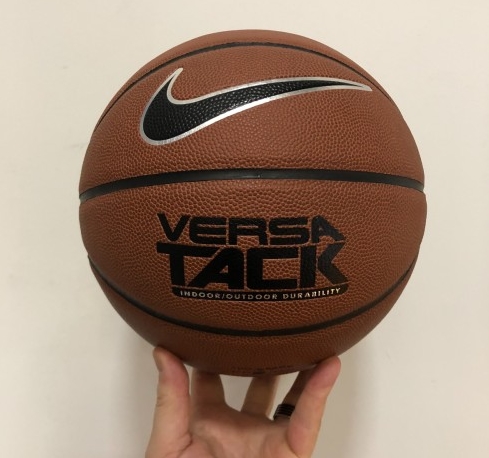 Holding Nike Versa Tack ball