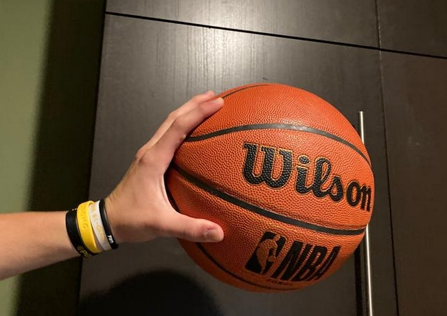 Holding ball with one hand