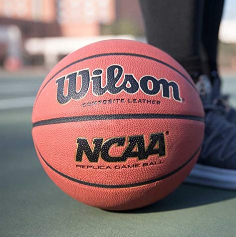 Ncaa replica ball on outdoor court